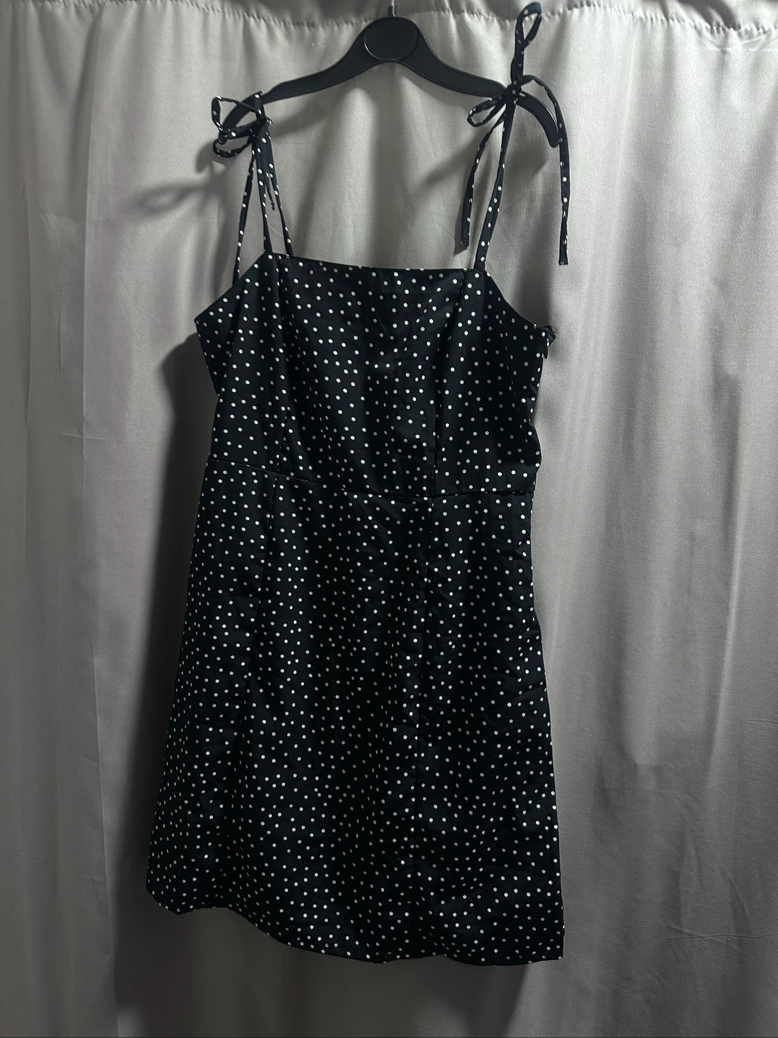 Petite robe noire à pois taille s neuve